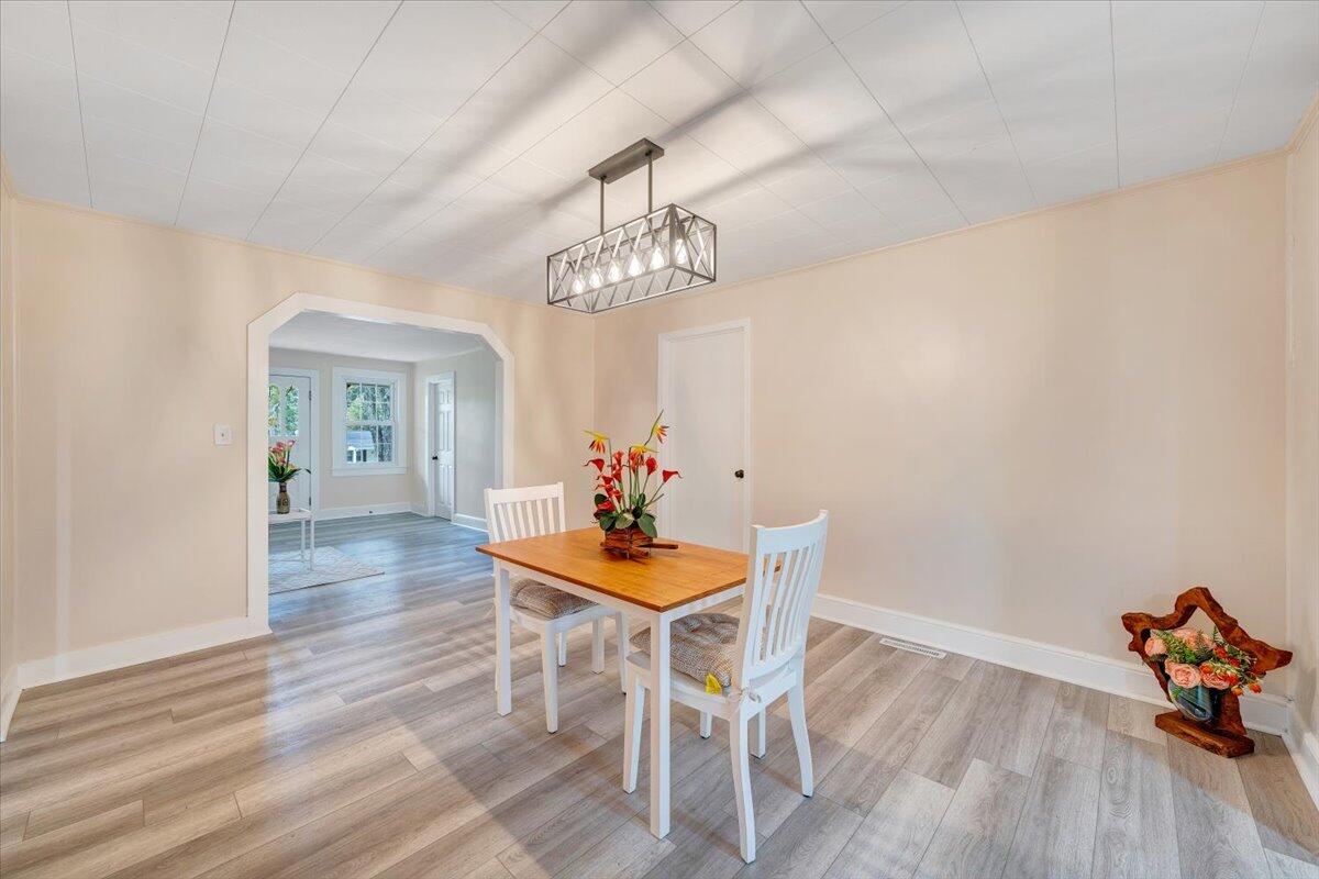 1433 Chalk Level Road Chatham, VA 24531 - Photo 26 of 41 a dining room with furniture and wooden floor