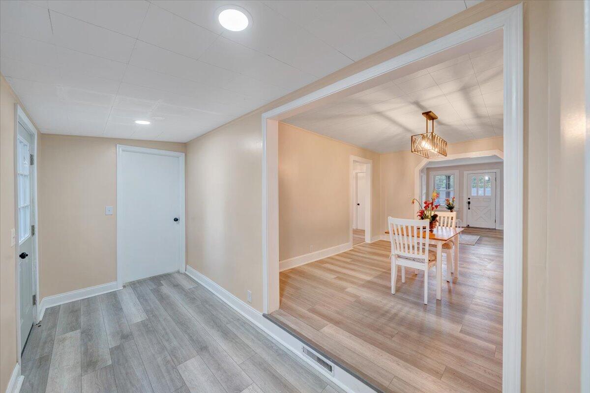 1433 Chalk Level Road Chatham, VA 24531 - Photo 30 of 41 a view of a dining room with furniture and wooden floor