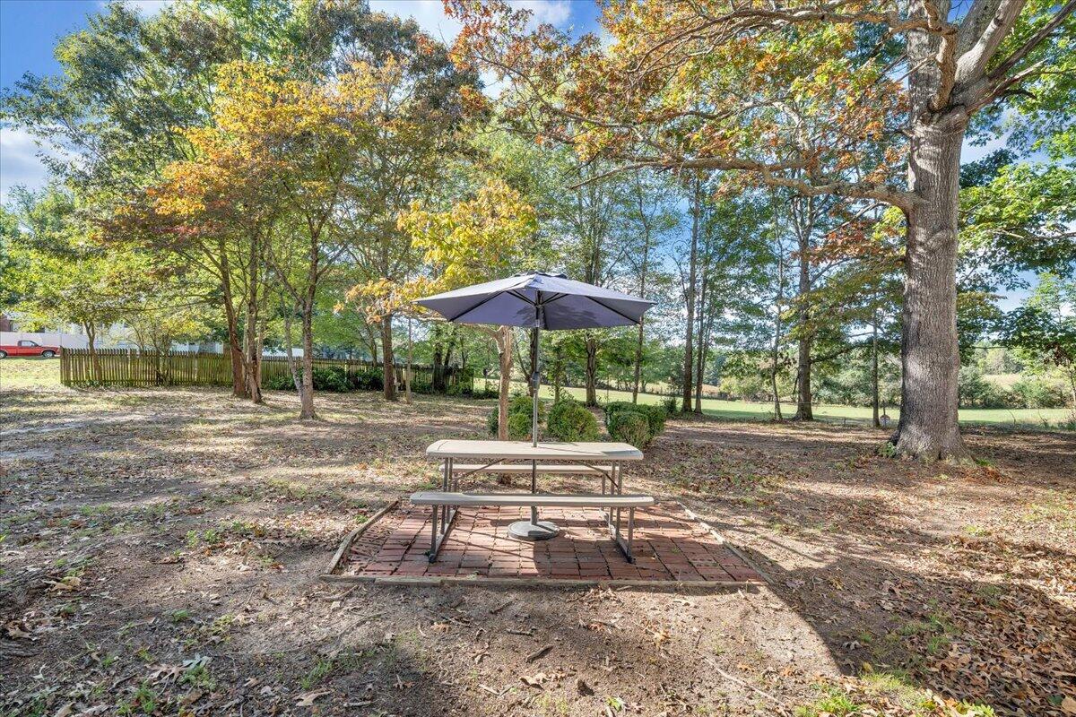 1433 Chalk Level Road Chatham, VA 24531 - Photo 36 of 41 a backyard of a house with table and chairs