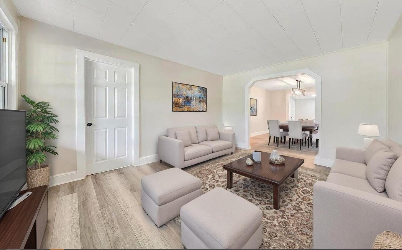 1433 Chalk Level Road Chatham, VA 24531 - Photo 6 of 41 a living room with furniture and a potted plant