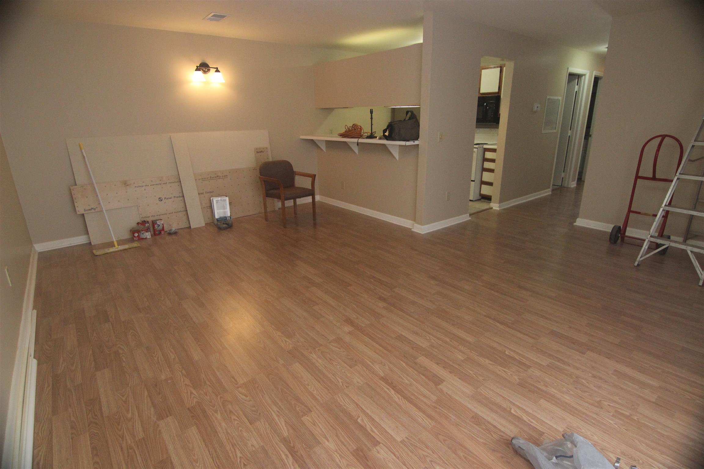 1245 Old Lascassas Road, Unit F Murfreesboro, TN 37130 - Photo 2 of 9 a view of a livingroom with furniture and a flat screen tv
