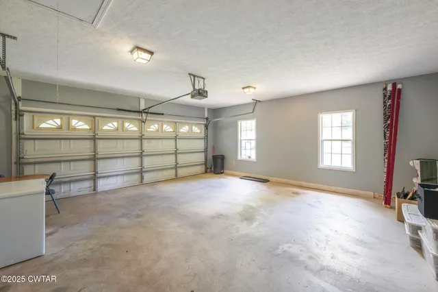 a view of a livingroom with a large window