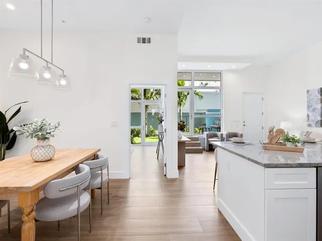 a view of a kitchen from the hallway