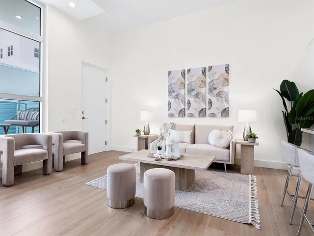 a living room with furniture and rug
