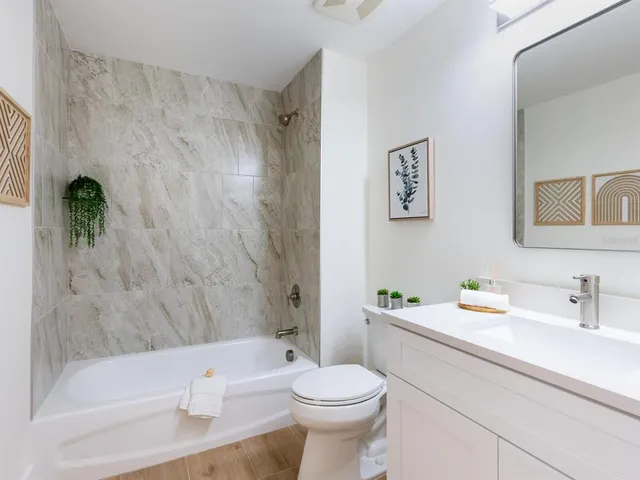 a view of a city with an ocean view