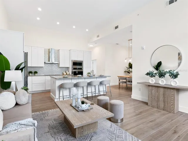 a bedroom with a bed and a couch