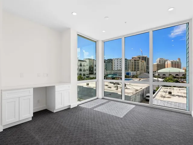 a view of dinning tables and chairs in patio