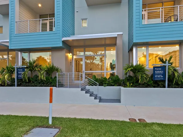 a front view of a building with an outdoor space