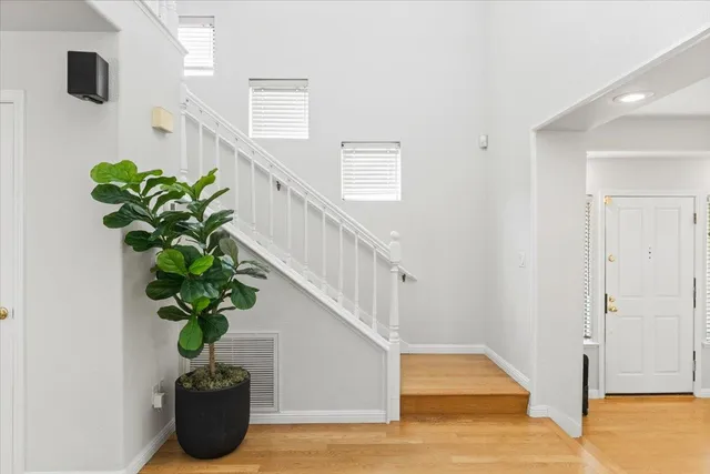 a view of entryway with wooden floor