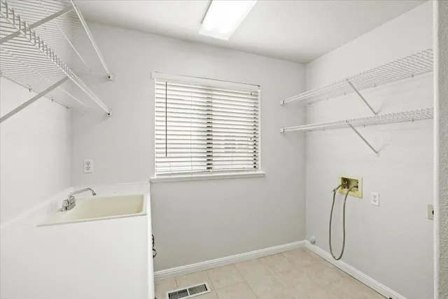 a bed room with double bed and a window