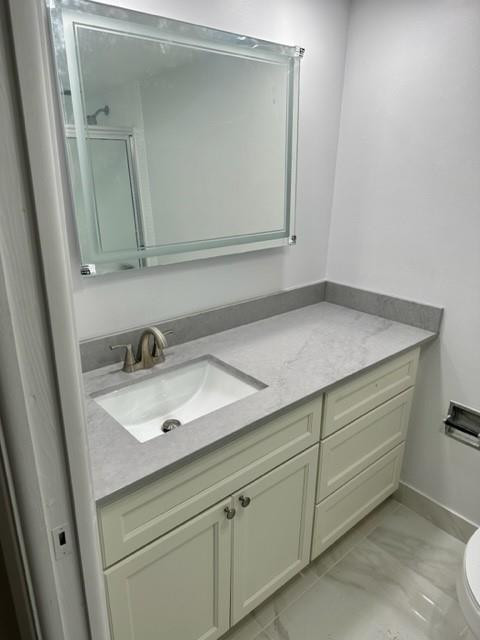 2650 South Course Drive, Unit 603 Pompano Beach, FL 33069 - Photo 15 of 25 a bathroom with a sink and a mirror
