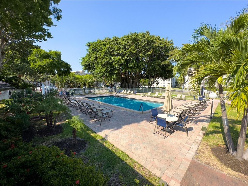 2650 South Course Drive, Unit 603 Pompano Beach, FL 33069 - Photo 23 of 25 a view of a park with large trees