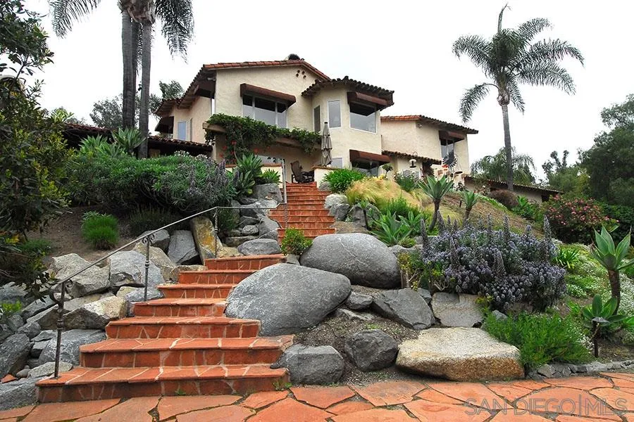 6515 Poco Lago Rancho Santa Fe, CA 92091 - Photo 17 of 25 a view of a chairs and tables in the patio