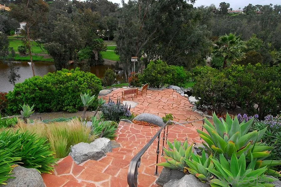 6515 Poco Lago Rancho Santa Fe, CA 92091 - Photo 19 of 25 an aerial view of a house with yard and lake view