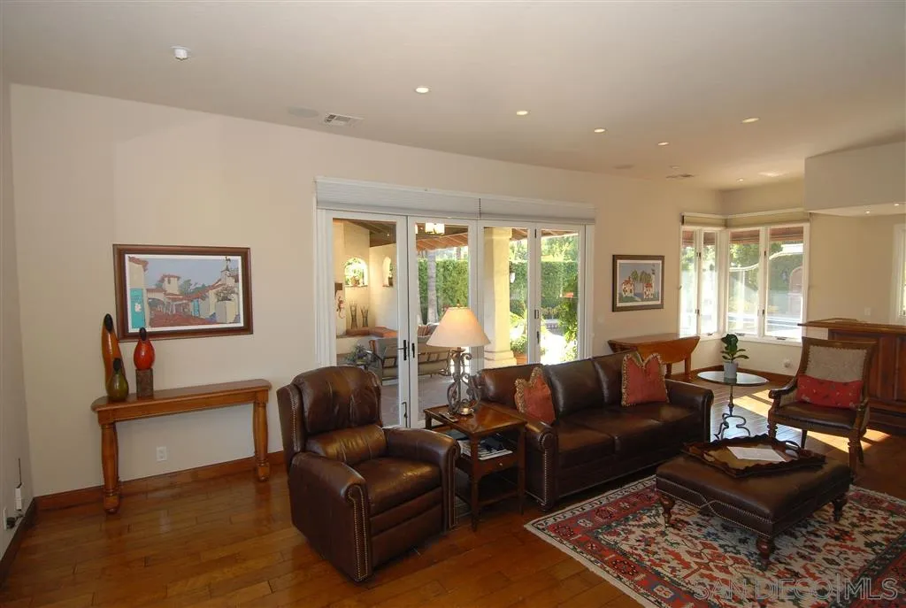 6515 Poco Lago Rancho Santa Fe, CA 92091 - Photo 8 of 25 a living room with furniture and a large window