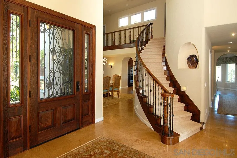 6515 Poco Lago Rancho Santa Fe, CA 92091 - Photo 10 of 25 a view of an entryway with staircase