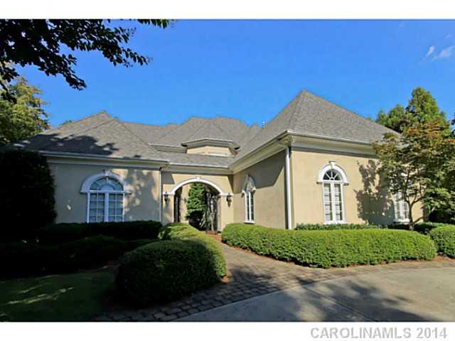 18804 Windy Point Drive Cornelius, NC 28031 - Photo 1 of 12 a front view of a house with a garden