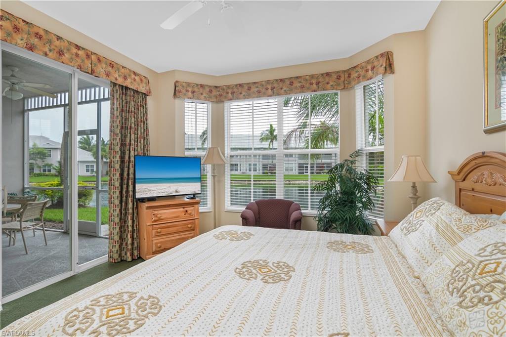 791 14th Street Northeast Naples, FL 34120 - Photo 28 of 46 Bedroom featuring access to outside and a ceiling fan