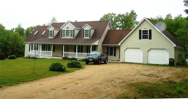 120 Clapp Road Hardwick, MA 01037 - Photo 1 of 20 a view of a house with yard and sitting area
