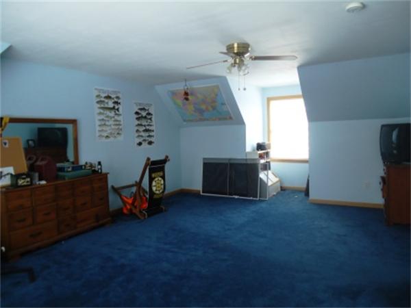 120 Clapp Road Hardwick, MA 01037 - Photo 19 of 20 a living room with furniture and a flat screen tv