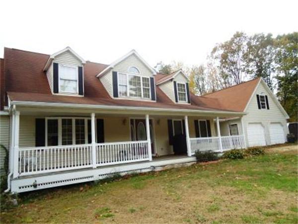 120 Clapp Road Hardwick, MA 01037 - Photo 3 of 20 front view of a house with a small yard