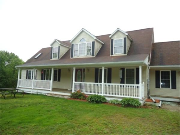 120 Clapp Road Hardwick, MA 01037 - Photo 4 of 20 a house view with a garden space