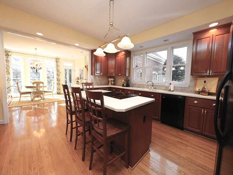8808 Ross Court Raleigh, NC 27613 - Photo 2 of 25 There's plenty of room for several cooks or kitchen helpers in this efficient and large kitchen. Kitchen