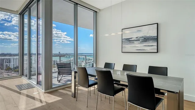 a spacious bathroom with a shower sink mirror and toilet