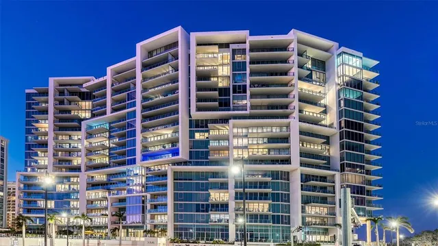 a view of a balcony with chairs