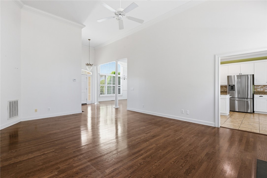 110 Garden Gate Drive Anderson, SC 29621 - Photo 14 of 35 This airy living space features lustrous hardwood floors and high ceilings, perfect for comfortable gatherings.