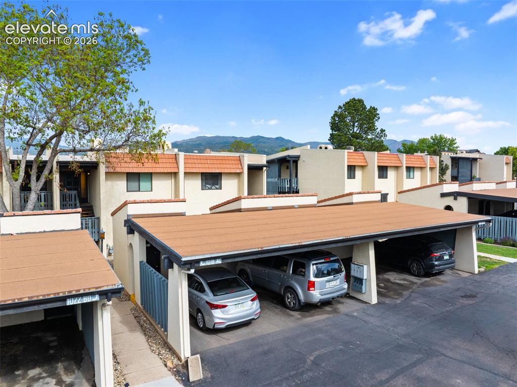 1018 Fontmore Road, Unit A Colorado Springs, CO 80904 - Photo 4 of 28 a view of a car park in front of house