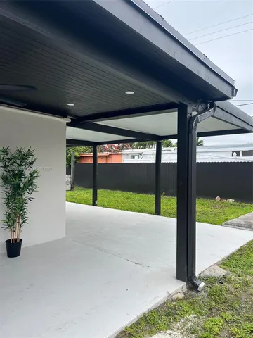 a view of an entryway with a garden