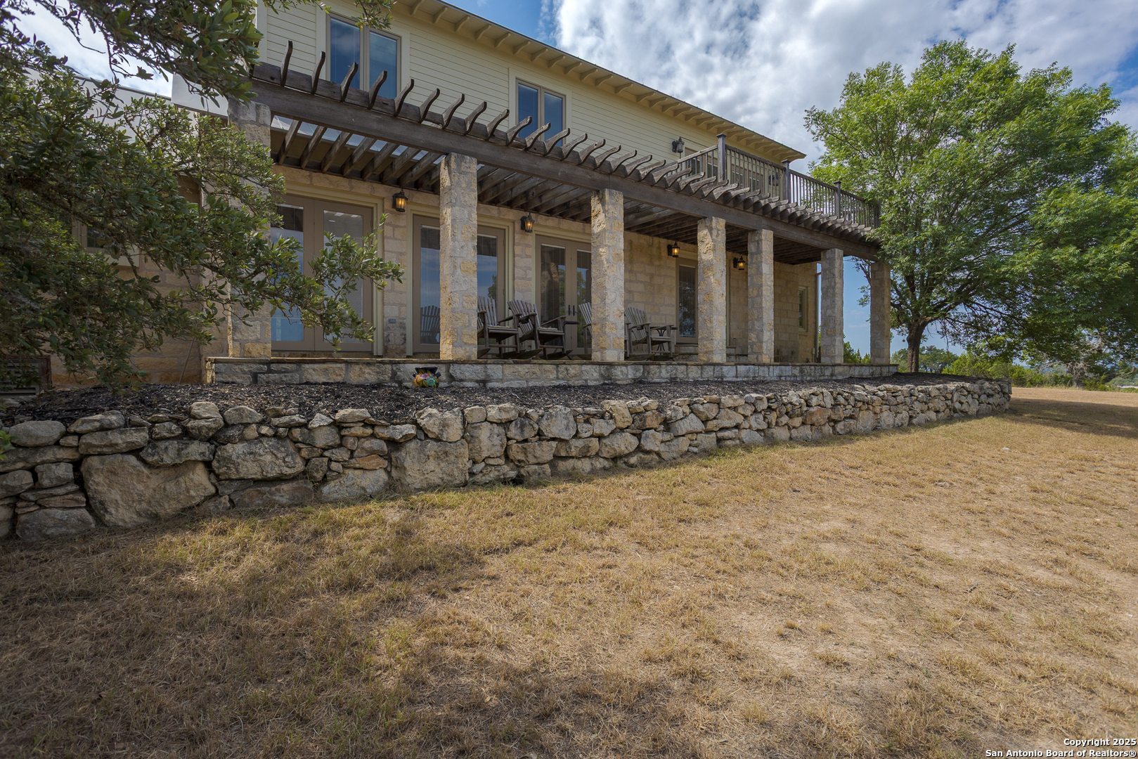 597 Krause Road Pipe Creek, TX 78063 - Photo 34 of 70 a front view of a house with a yard