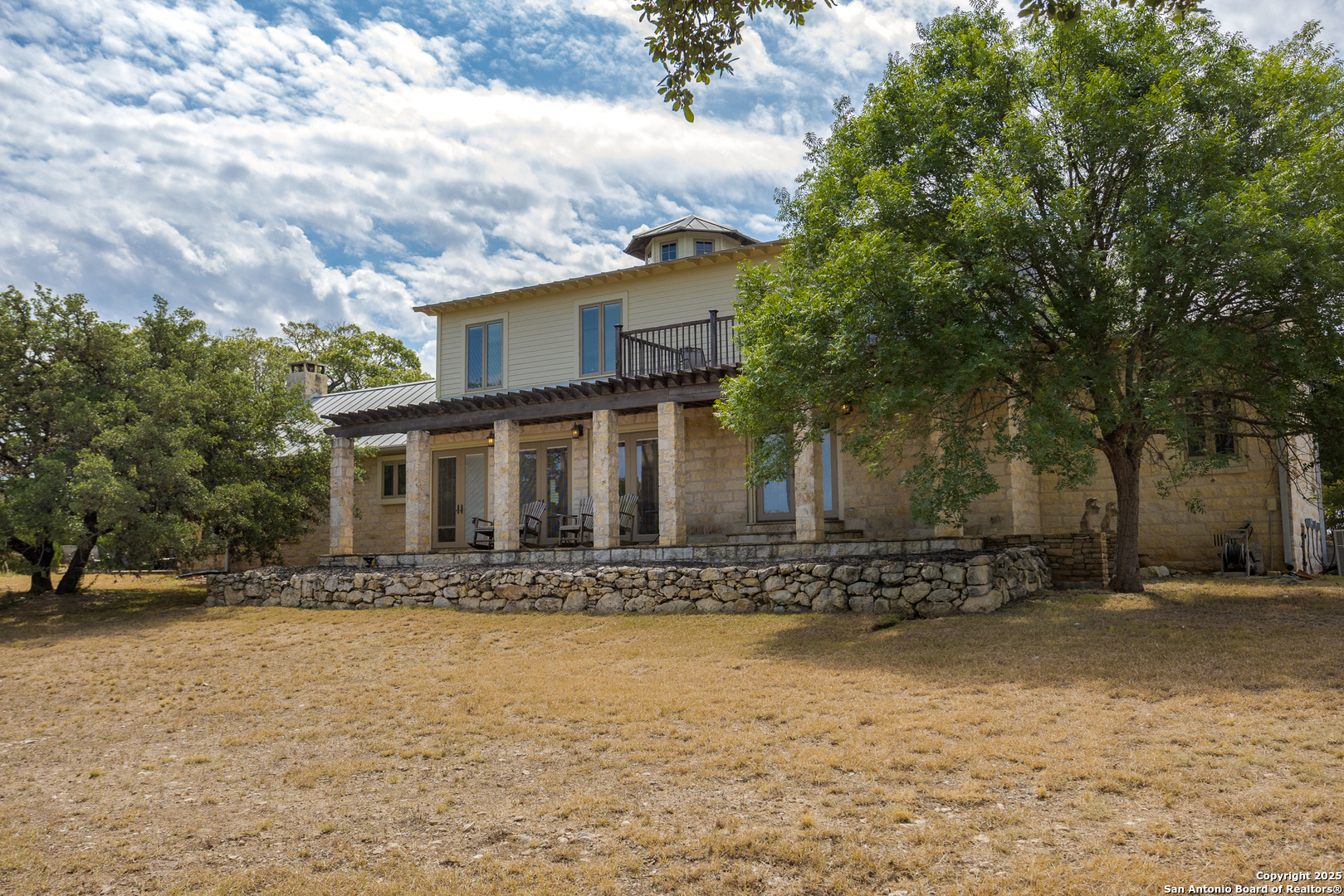 597 Krause Road Pipe Creek, TX 78063 - Photo 35 of 70 a front view of a house with a yard