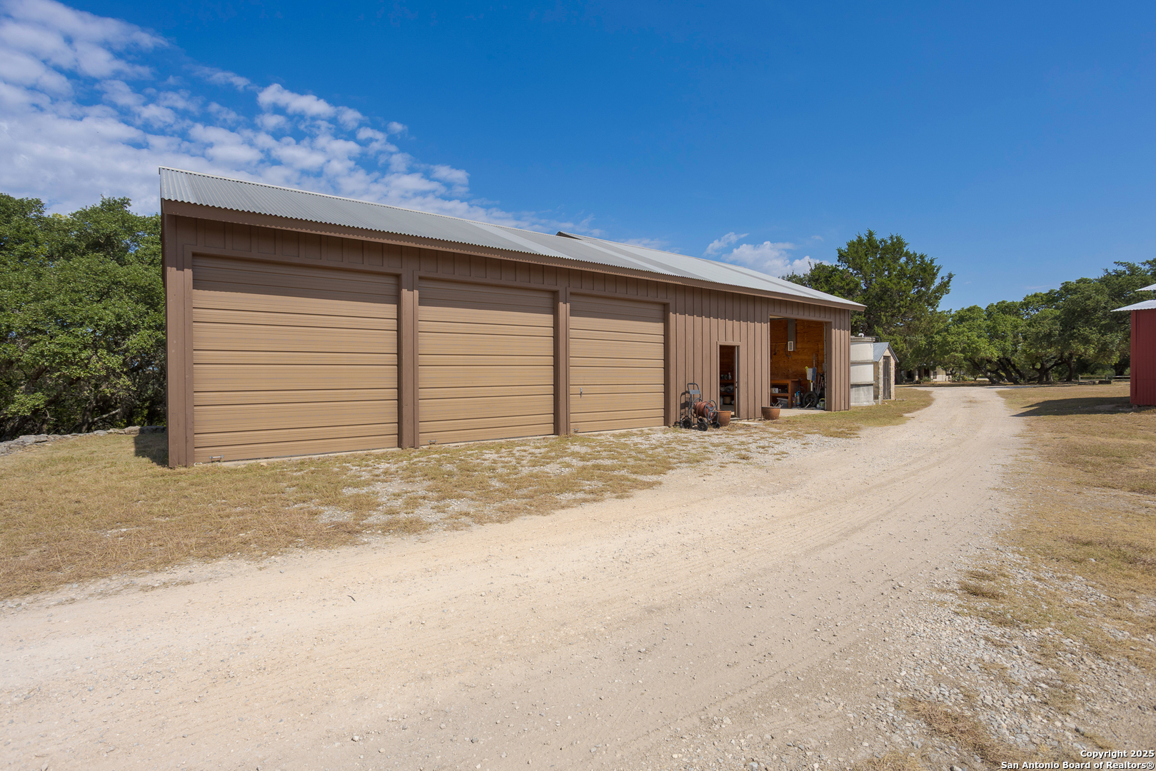 597 Krause Road Pipe Creek, TX 78063 - Photo 39 of 70 a view of a house with a outdoor space