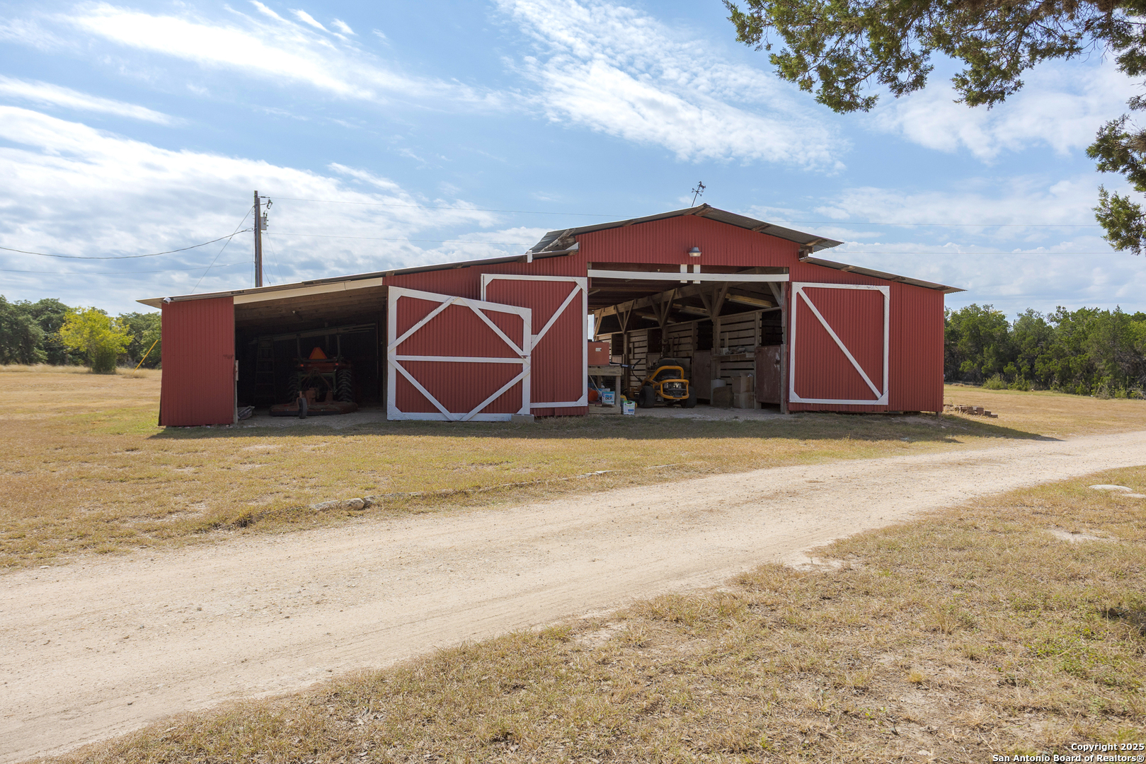 597 Krause Road Pipe Creek, TX 78063 - Photo 45 of 70 a front view of a house with a yard
