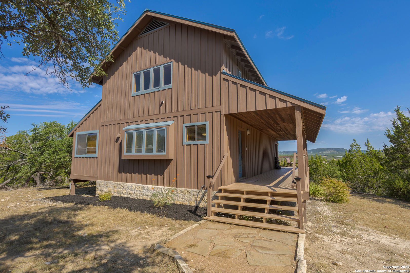 597 Krause Road Pipe Creek, TX 78063 - Photo 49 of 70 a front view of a house with a yard