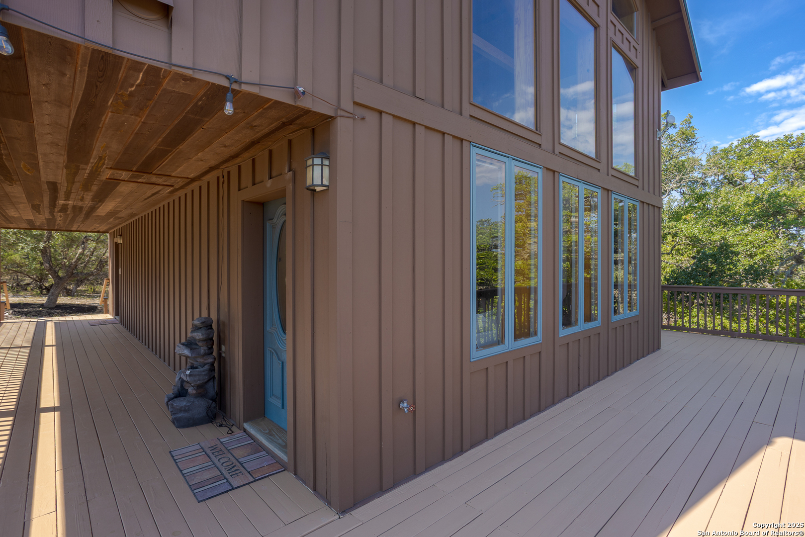 597 Krause Road Pipe Creek, TX 78063 - Photo 51 of 70 a view of a house with a door and wooden floor