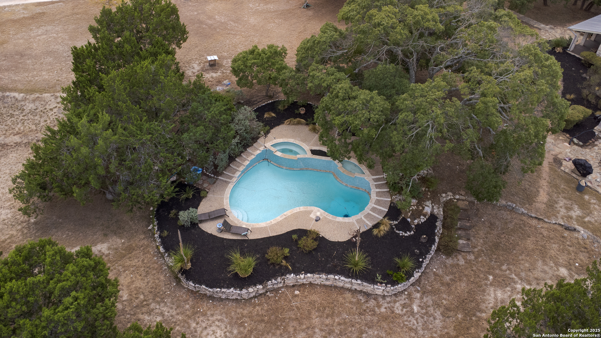 597 Krause Road Pipe Creek, TX 78063 - Photo 68 of 70 an aerial view of a house with outdoor space