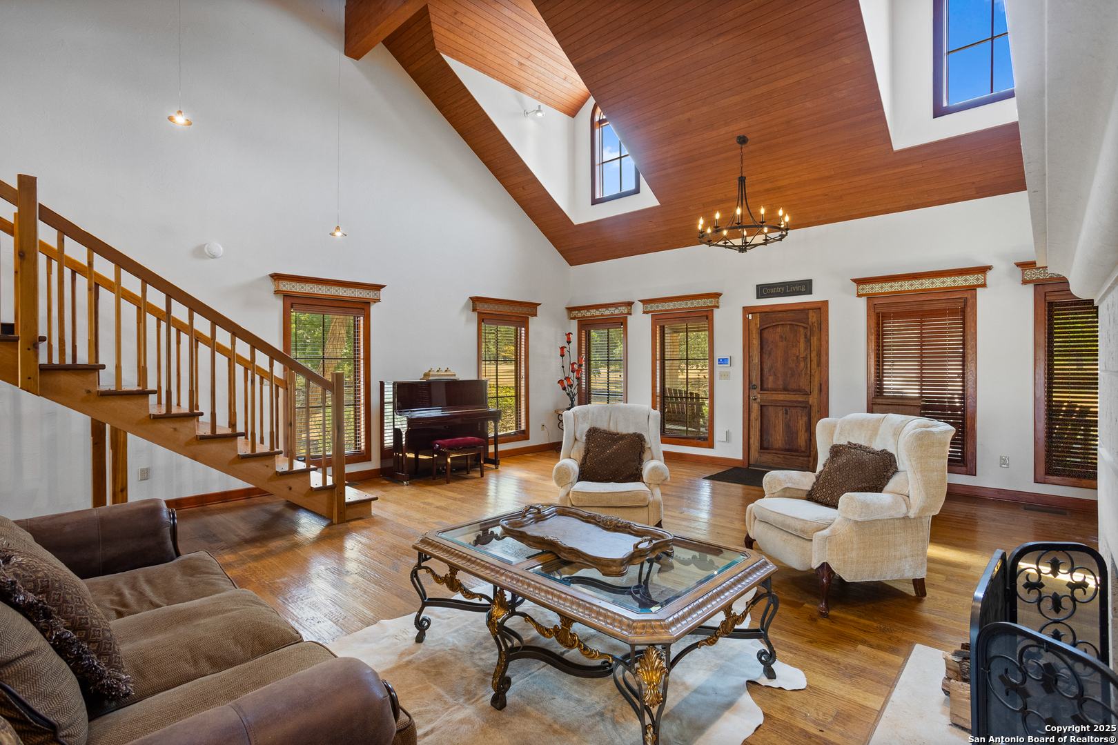 597 Krause Road Pipe Creek, TX 78063 - Photo 7 of 70 a living room with furniture fireplace and a table