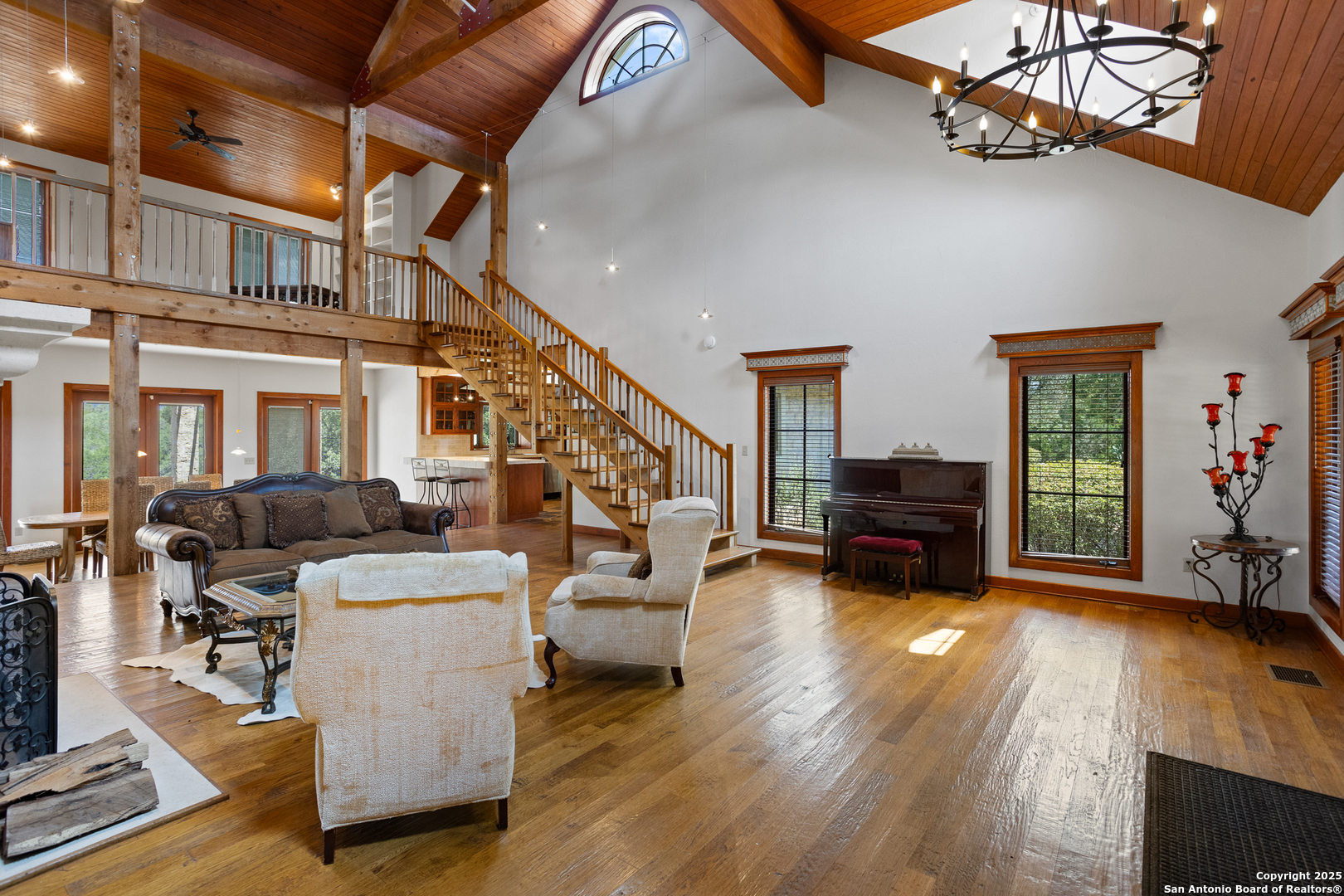 597 Krause Road Pipe Creek, TX 78063 - Photo 8 of 70 a living room with furniture and a wooden floor
