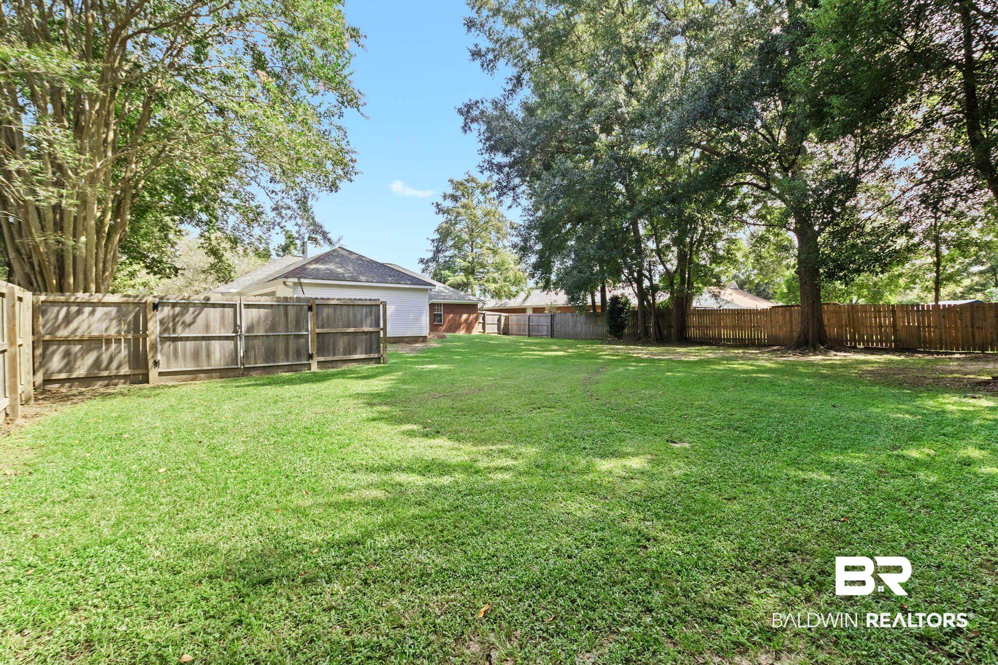 20685 Lowry Drive Fairhope, AL 36532 - Photo 43 of 48 View of fenced backyard