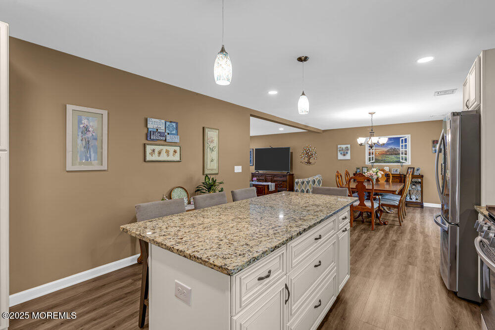 119 Darien Road Howell, NJ 07731 - Photo 18 of 47 a living room with stainless steel appliances granite countertop furniture and a kitchen view