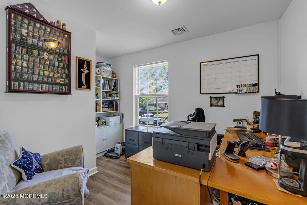 119 Darien Road Howell, NJ 07731 - Photo 29 of 47 a work room with furniture and a window
