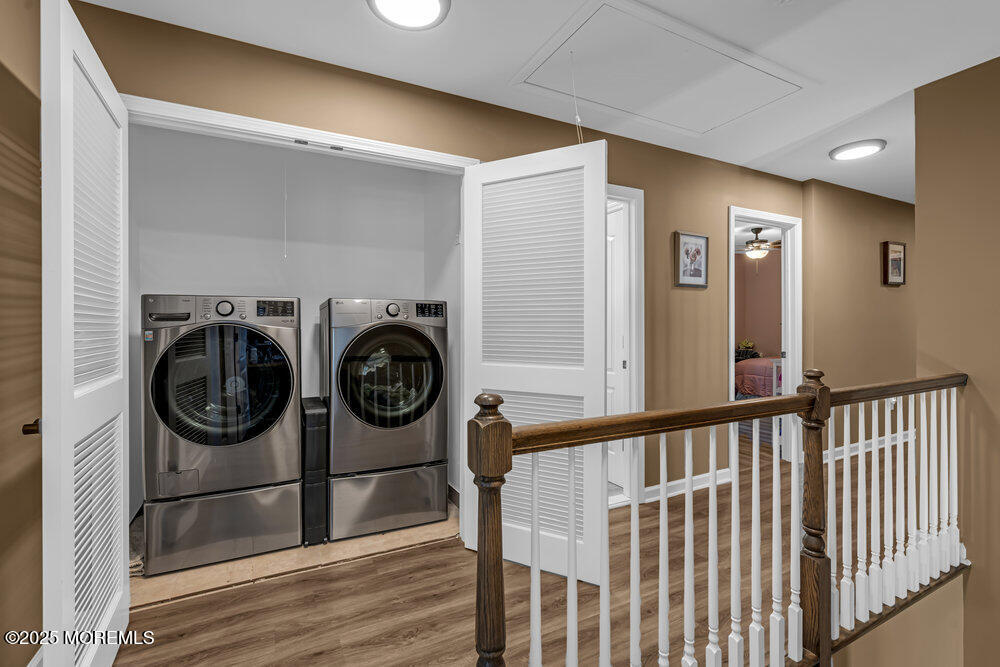 119 Darien Road Howell, NJ 07731 - Photo 31 of 47 a view of a hallway with washer and dryer