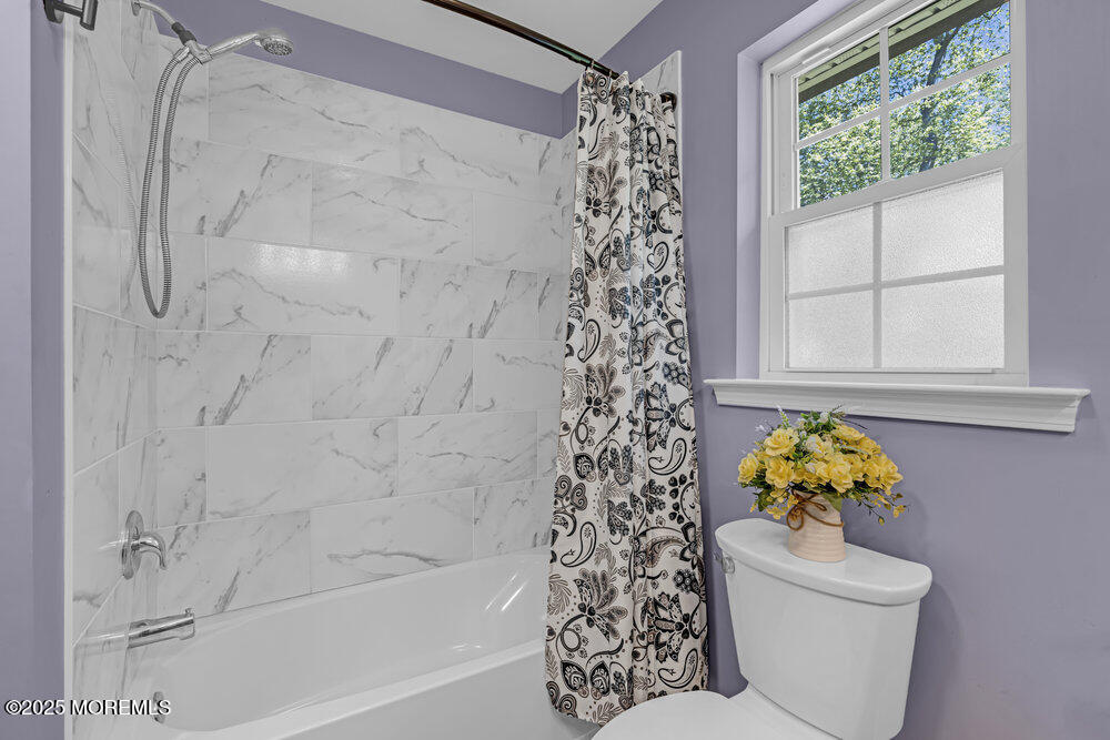 119 Darien Road Howell, NJ 07731 - Photo 33 of 47 a bath room with a toilet and a shower