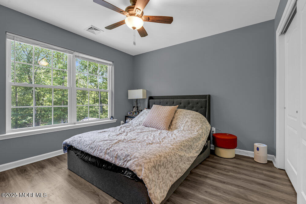 119 Darien Road Howell, NJ 07731 - Photo 36 of 47 a bedroom with a bed and window