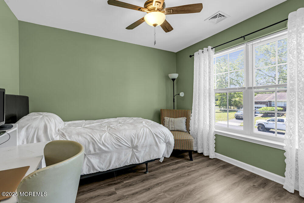 119 Darien Road Howell, NJ 07731 - Photo 37 of 47 a bedroom with a bed and a window