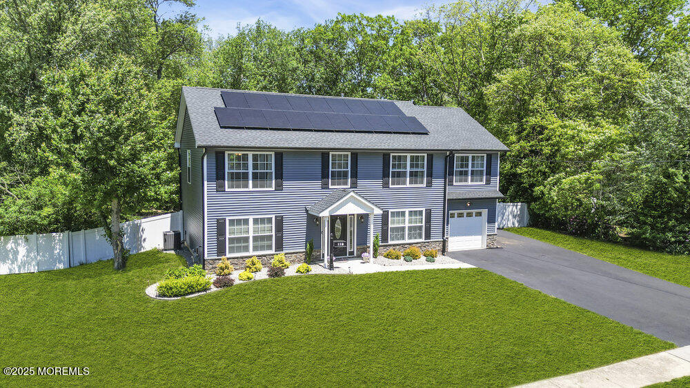 119 Darien Road Howell, NJ 07731 - Photo 38 of 47 a front view of a house with yard and green space