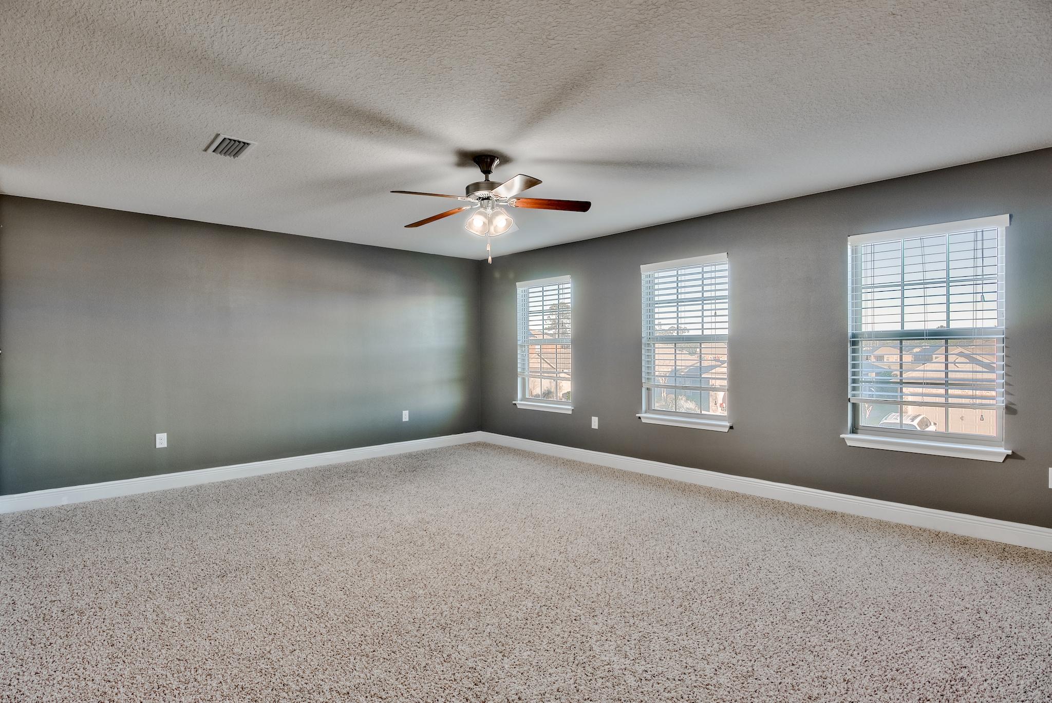 242 Pin Oak Loop Santa Rosa Beach, FL 32459 - Photo 19 of 43 a view of an empty room with a window